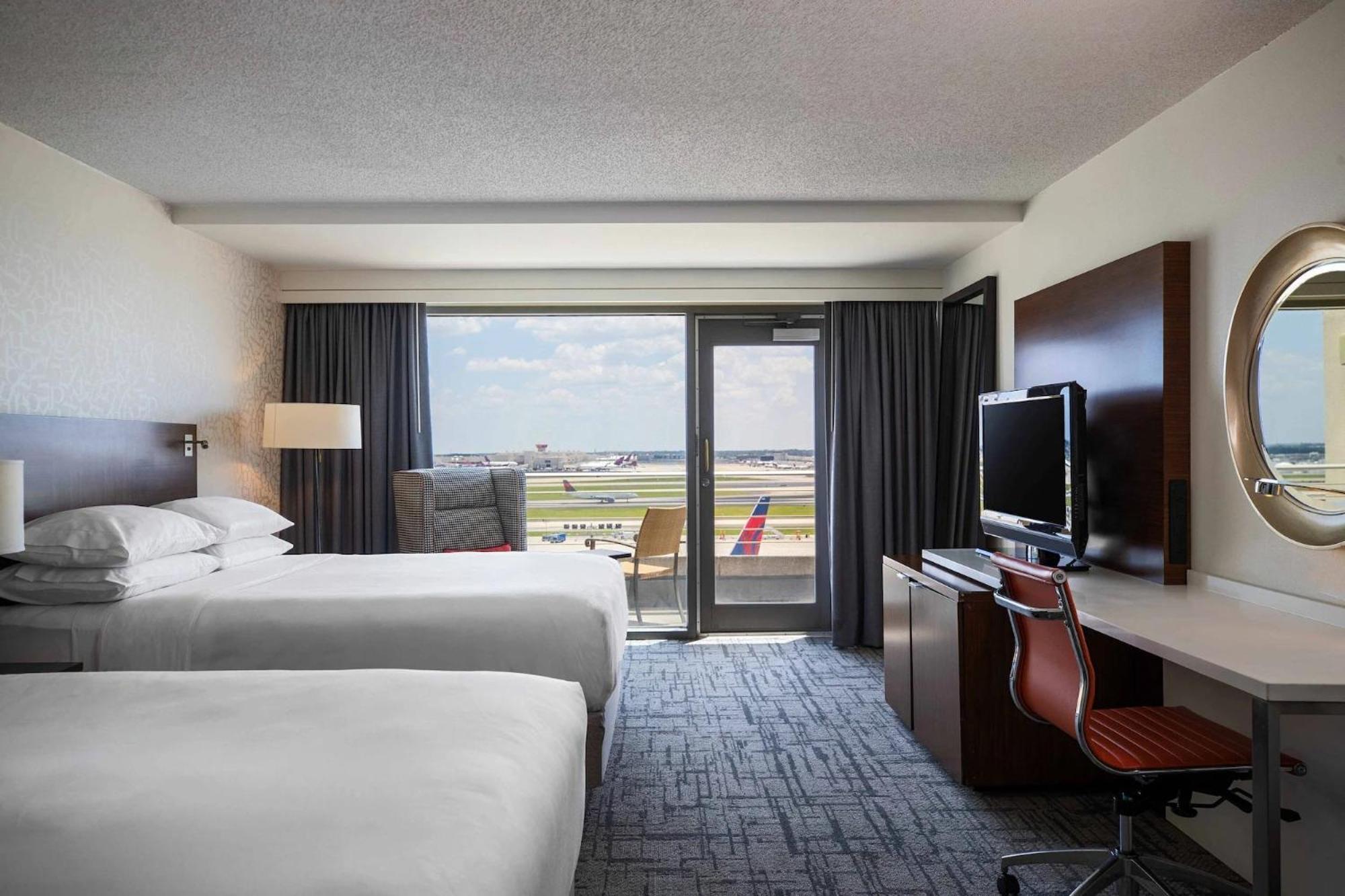 Runway View Guest room 2 Queen Balcony,1632242865:JPEG